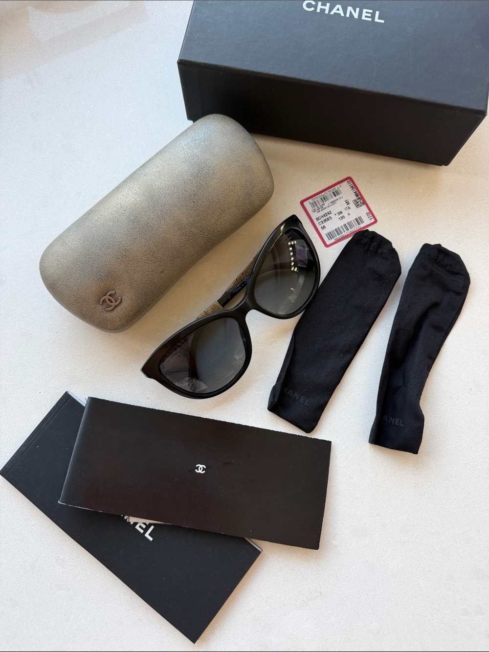 CHANEL Black Cat-Eye Sunglasses with Silver Accents